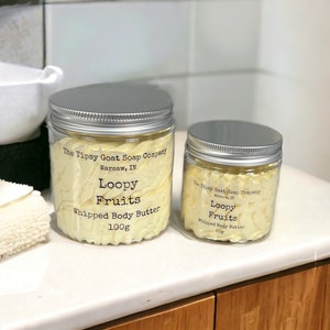 May include: Two jars of whipped body butter, one 100g and one 50g, both labeled "The Tipsy Goat Soap Company" and "Loopy Fruits".