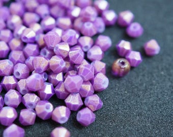 25 Spinning tops 4 MM in purple crystal N8