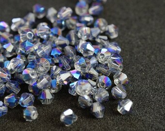 25 TOUPIES 4mm en cristal TRANSPARENT Et BLEU N86