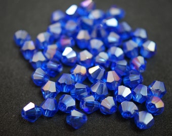 10 Toupies 6mm en cristal  BLEU CLAIR AB N53