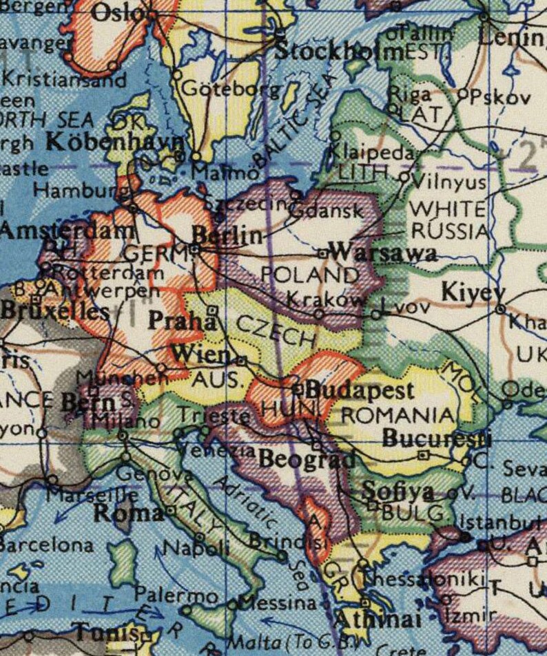 May include: A vintage map of Europe with country borders and major cities labeled. The map is printed on paper with a light blue background and features a variety of colors to distinguish the different countries. The map includes the countries of Norway, Sweden, Finland, Denmark, Germany, Poland, Czech Republic, Austria, Hungary, Romania, Bulgaria, Greece, Turkey, Italy, Switzerland, France, Belgium, Netherlands, and the United Kingdom.