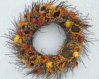 shades of orange and gold dried flower wreath with wild blueberry twig background/orange & gold indoor dried flower wreath/inside wall wreth