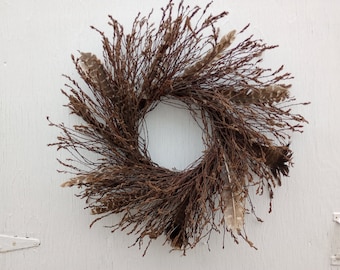 sweet fern wreath with turkey feathers/sweet fern wreath with found turkey feathers/sweet fern wreath with wild turkey feathers/sweet fern