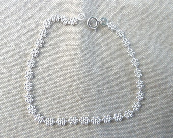 Silver bracelet "Beaded flowers"