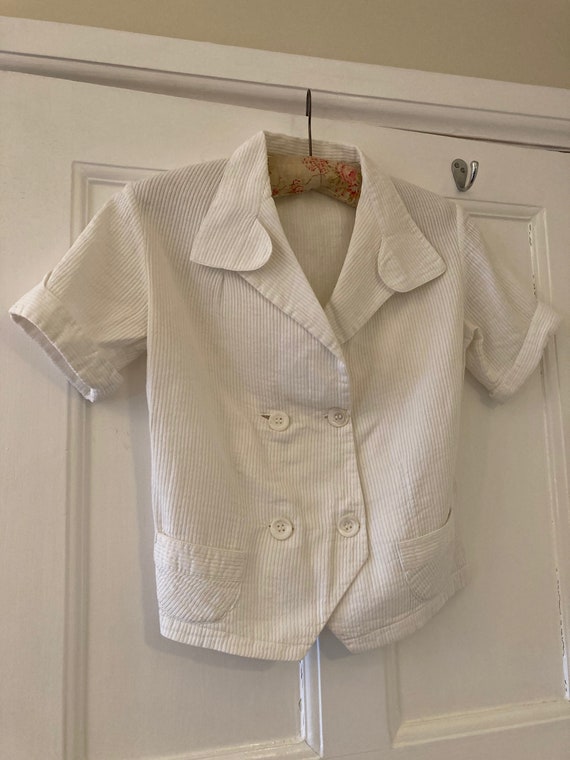 1930s ribbed ivory cotton short sleeve waistcoat s