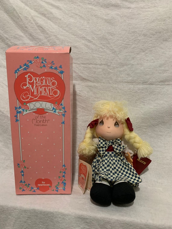 precious moments dolls of the month