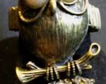 Vintage adjustable owl ring, with pearl  eyes