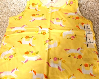 Girls sleeveless yellow top, with ponies.  Size med