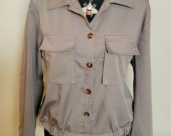 Army green bomber style jacket.  Size large