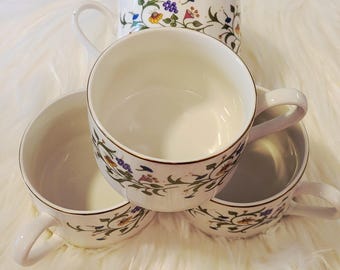 Set of 4 Farberware ashbury fine china teacup. Colorful floral & berry design.