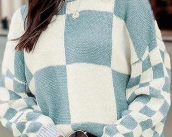 Blue and white checkered design sweater. 3x