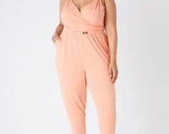 Size 14/16 Embellished tapered jumpsuit.  Color Shrimp