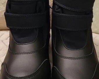 All in motion , Kids winter boots.  Size 4