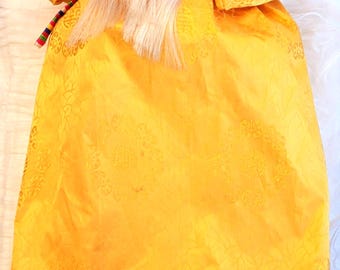Vintage korean doll in yellow kimona
