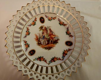 Small Vintage German porcelain courting couple plate.