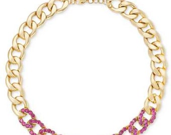 Large chain links are partially set with colored crystals collar necklace.