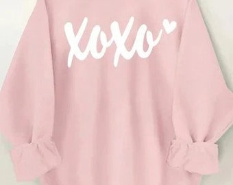 Ladies  pink xoxo graphic sweatshirt. 3x