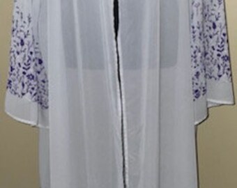 Light purple kimono with floral designs.  3x