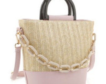 Beautiful bucket style handbag, with links design.