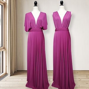 May include: Two long, magenta-colored dresses with a deep V-neckline. One dress has short sleeves and the other is sleeveless. Both dresses have a sash that can be tied at the waist.