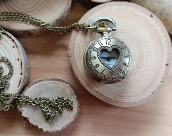 Vintage watch with an ornate heart-shaped dial, suitable as a pocket watch or long necklace, approximately 2.8cm in diameter, French touchscreen, spare battery, 70cm necklace chain