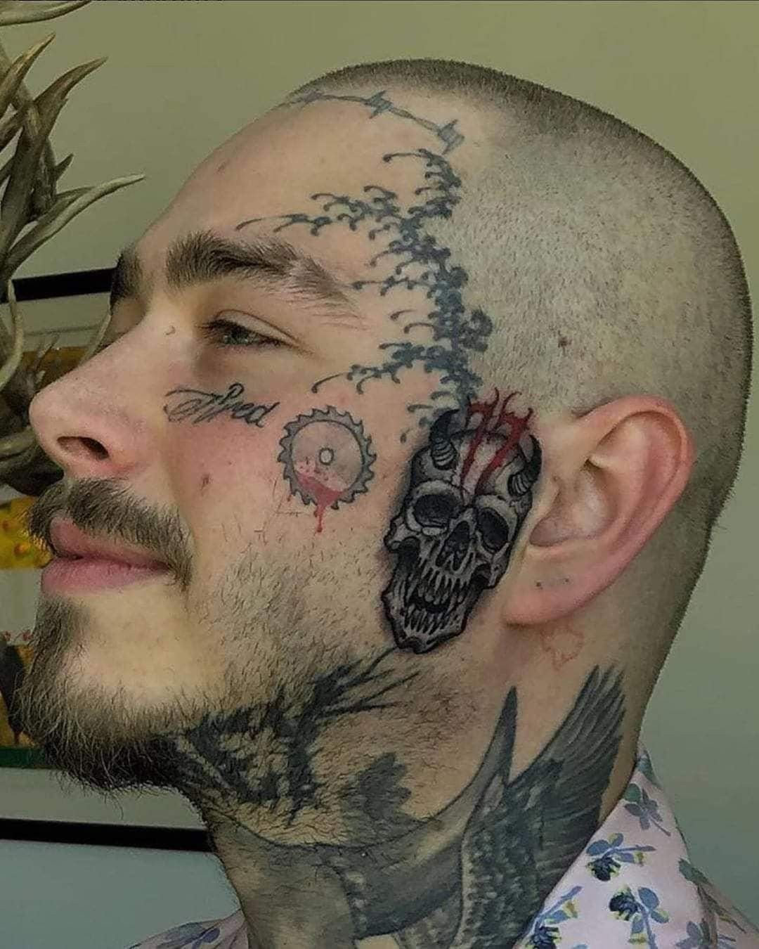 Post Malone Debuts Face Tattoo with Daughters Initials  RapUp