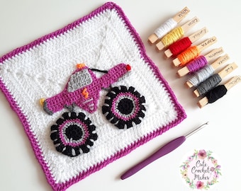 May include: A crochet monster truck square with pink, black, gray, and white yarn. The square is surrounded by a pink border. The yarn colors are displayed on wooden clothespins with labels.
