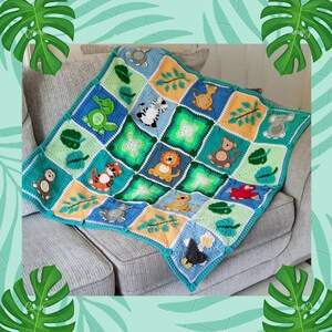 May include: A crocheted baby blanket with a jungle theme. The blanket features squares with different animals, including a lion, monkey, zebra, turtle, and elephant. The squares are surrounded by green leaves.