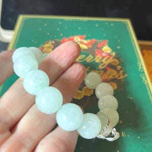 Special sale 50%off. Grade A Natural jadeide jade untreated or undyed icy light green and transparent 12 mm