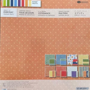 May include: A pack of designer paper with a peach background and white polka dots. The pack includes various patterned paper samples in different colours and designs. Text on the package reads "Perfect Fit Everyday Designer Prints."
