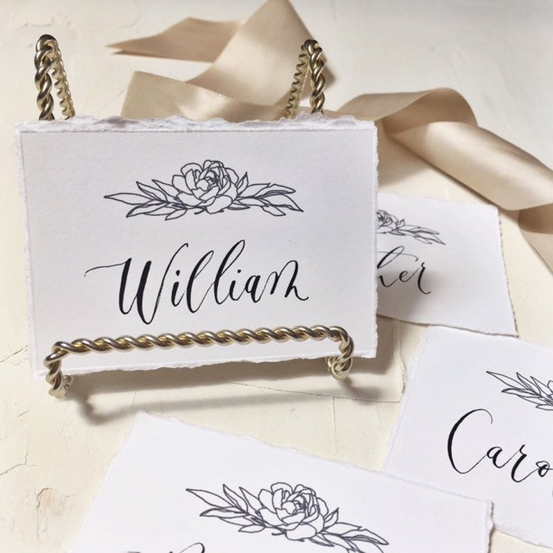 Handwritten custom modern calligraphy placecard with peony flower illustration and hand torn deckled edges wedding escort name place cards