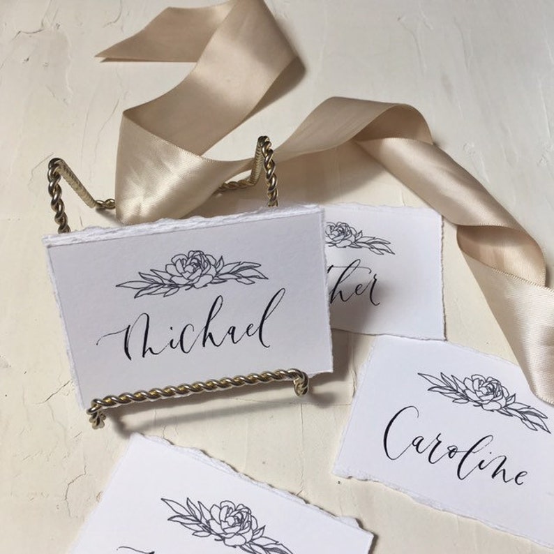 Handwritten custom modern calligraphy placecard with peony flower illustration and hand torn deckled edges wedding escort name place cards
