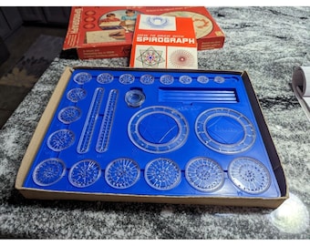 Juego de espirógrafo Kenner's 401 VINTAGE de 1967, caja azul con bandeja e instrucciones originales.