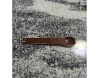 Colher de reposição vintage marrom para medir 1/4 de colher de chá da Tupperware