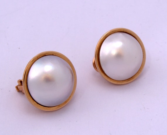 omega back pearl earrings