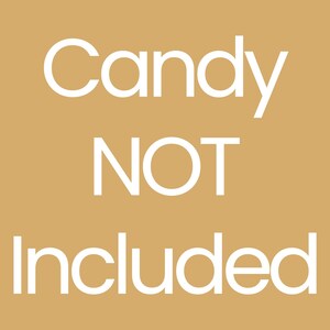 May include: A tan background with the words "Candy NOT Included" in white, bold, sans-serif font. The text is centered and stacked vertically, with "Candy" at the top, "NOT" in the middle, and "Included" at the bottom.