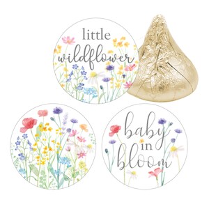 Close-up of Baby in Bloom wildflower sticker design, pink floral baby shower favor labels