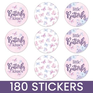 May include: Nine round stickers with butterfly designs. Some stickers say "Butterfly kisses" in purple script on a pink background. Other stickers have butterfly patterns in pink and blue. The bottom of the image says "180 STICKERS".