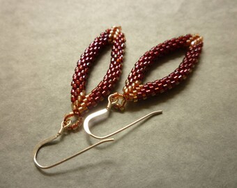 Elegant oval beaded earrings in copper AB and pale gold with sterling silver ear wires