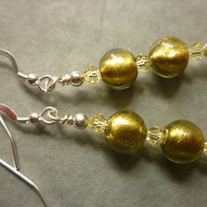 Dark olive green silver lined Murano glass earrings, with Swarovski crystals and sterling silver ear wires