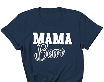 May include: A navy blue t-shirt with white text that reads "MAMA Bear".