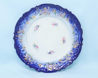 7.5" vintage/ antique flow blue plate with flowers and gilded leaves/ floral design, blue and white floral plate, flow blue china