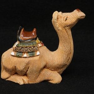 MINT 4 1/4&quot; tall Artesania Rinconada camel figurine, laying/ sitting camel figure, seated clay camel with a saddle, pottery camel decor gift