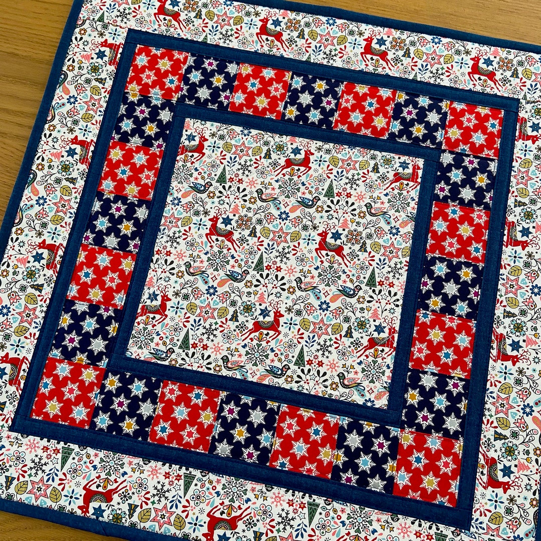 Winter Flame Quilted Table Topper NCU0NTD539