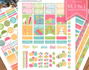 May include: Easter-themed planner stickers with colorful eggs, bunnies, and floral patterns. The stickers include phrases like "Happy Easter", "Workout", "Hydrate", "Hope", "Love", "Wish", "Feel", "Dream", and "Weekend".