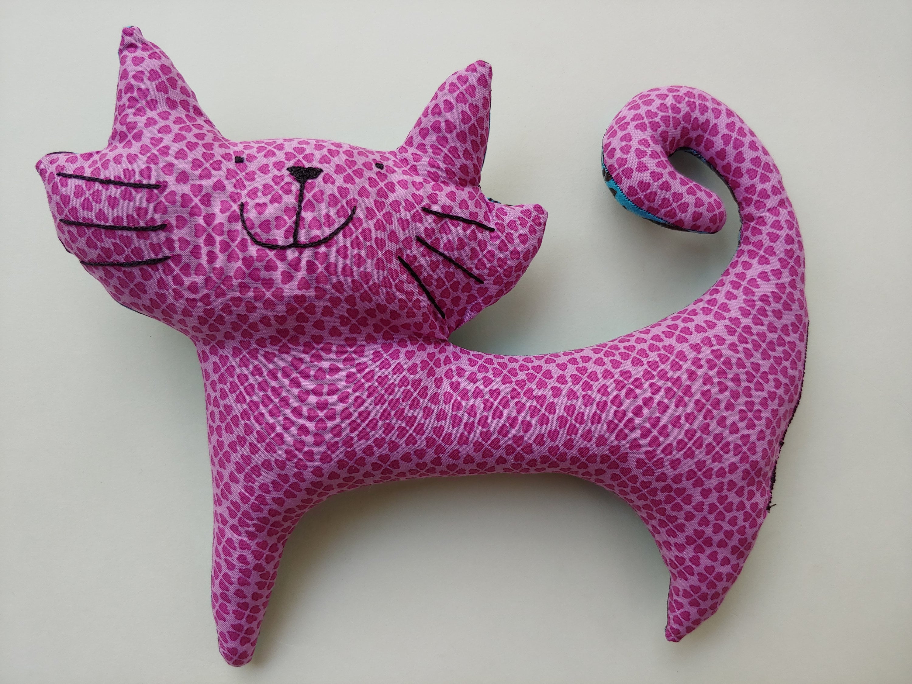 purple stuffed cat