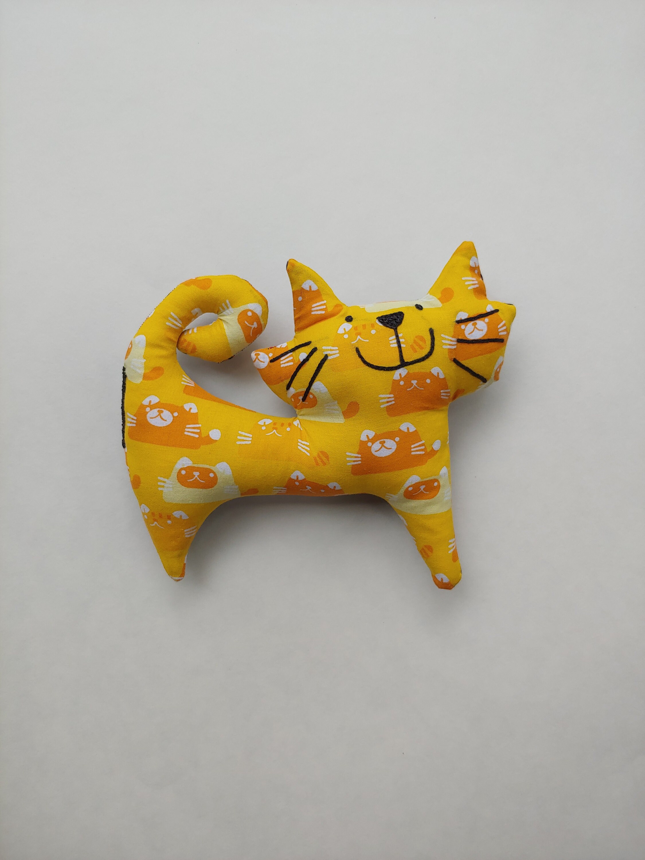 yellow stuffed cat