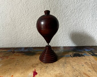 Vintage Mid-Century Modern Woodworking Turned Wood Spinning Top Toy with stand