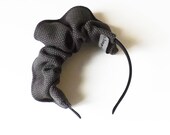 Dark grey curled circle