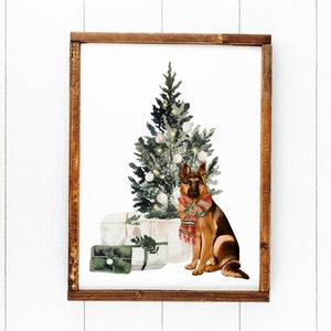 May include: A watercolor painting of a German Shepherd dog sitting in front of a Christmas tree with presents. The dog is wearing a red and white scarf. The tree is decorated with white ornaments and lights.